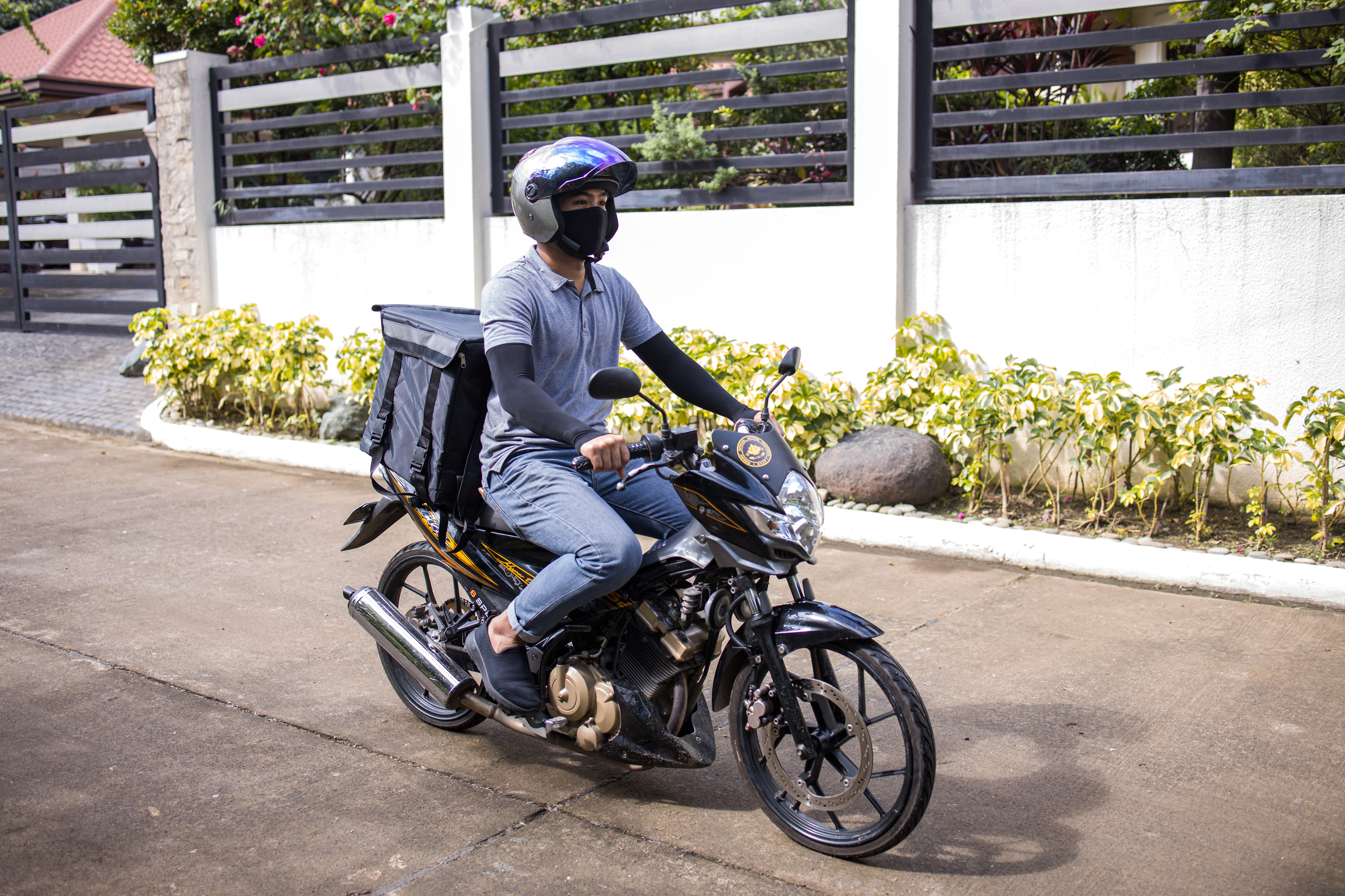 Deliveryman on Motorcycle
